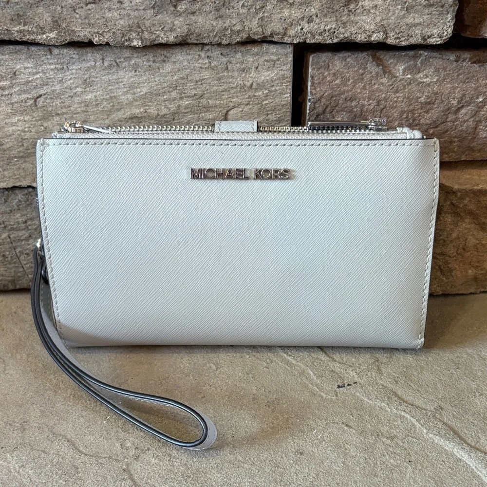 Michael Kors light grey wristlet/wallet